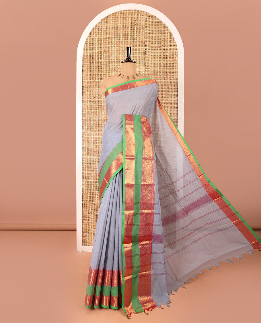 Silver grey plain Chettinad cotton saree, contrast traditional zari rettai pettu border, striped pallu, and a matching blouse