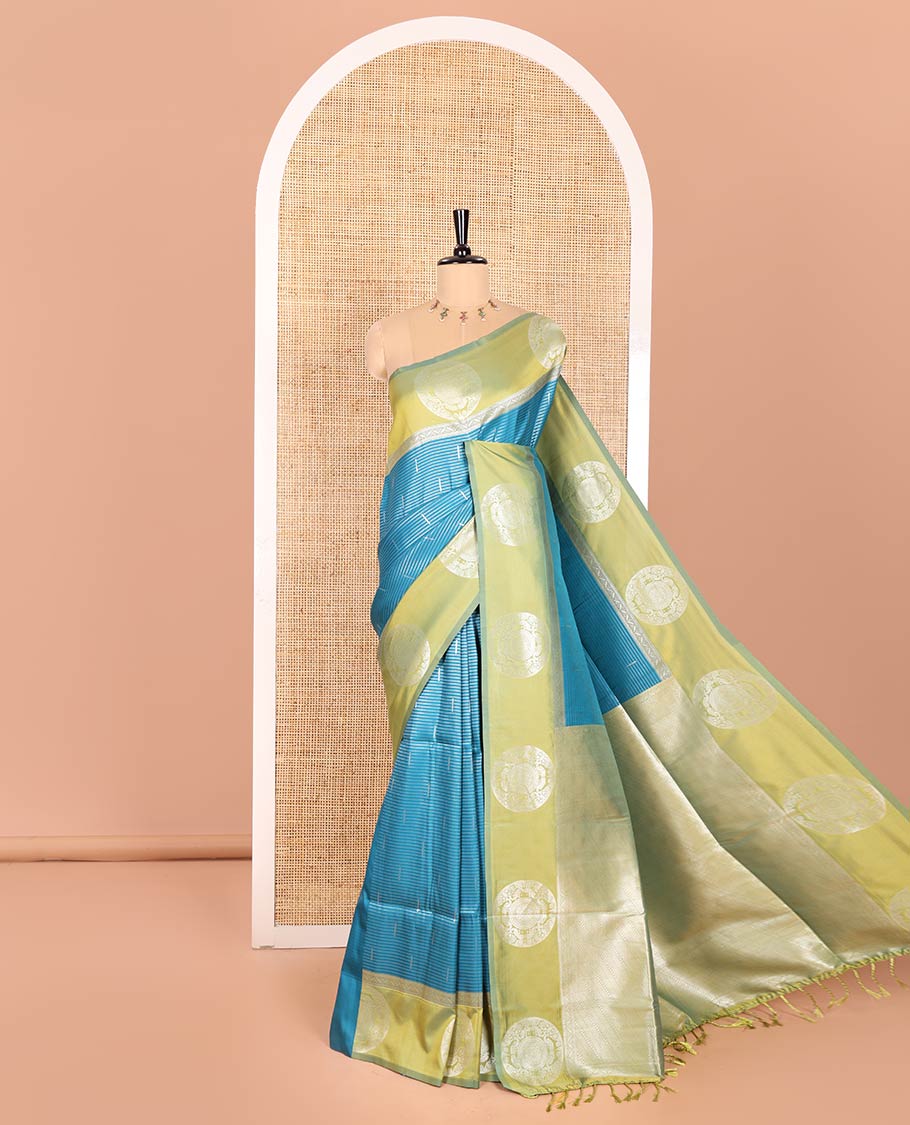Rama Elite Soft Silk Saree Ornamented with Vaira Oosi and Zari Buttas All Over Its Body, Complemented by a Contrast Border Featuring Chakram Motifs, Subtly Sparkled Pallu, and Paired with a Contrast Blouse