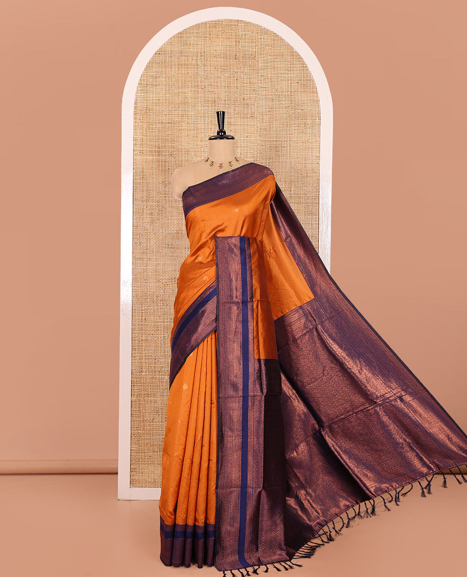 Orange Kanchi Silk Saree, Adorned with Zari Buttas All Over Its Body, Complemented by Contrast Rettai Pettu Traditional Zari Design Border, Gracefully Embellished Pallu, and Paired with a Contrast Blouse