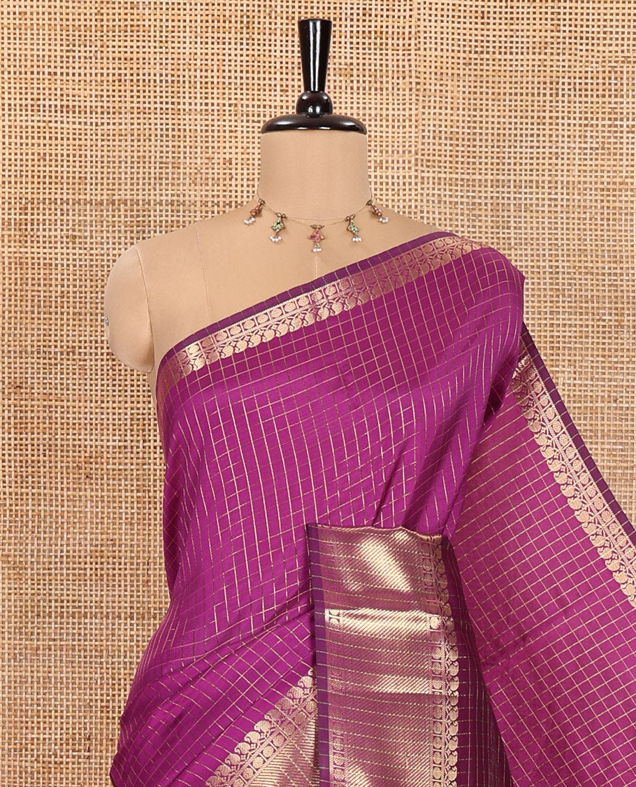 Purple Semi-Katan Silk Saree, Decorated with Golden Zari Checks on Its Body, Highlighted by a Traditional Zari Border of Paisley and Rudraksham Designs, Gleaming Pallu, and Paired with a Matching Blouse