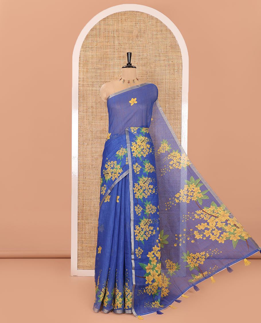 Blue Linen Saree, Beautified with Averrhoa Carambola-Style Floral Motifs Print, Subtle Piping Border, Pallu Mirrors the Same Print, and Paired with a Matching Blouse