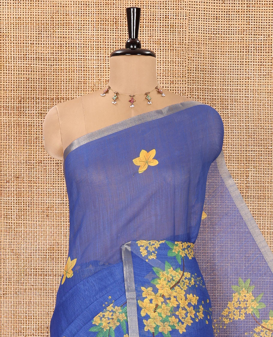 Blue Linen Saree, Beautified with Averrhoa Carambola-Style Floral Motifs Print, Subtle Piping Border, Pallu Mirrors the Same Print, and Paired with a Matching Blouse