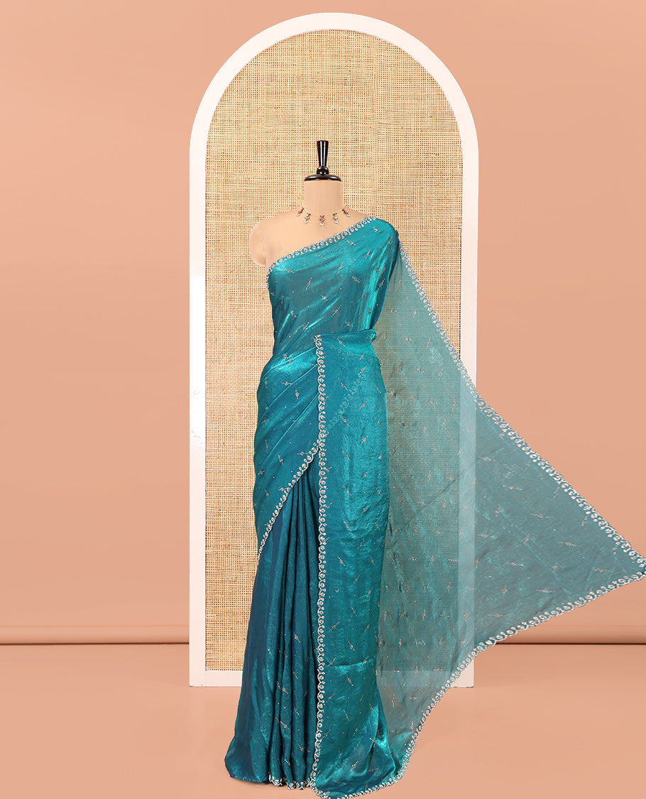 Blue Fendy Chiffon Saree, Highlighted by Swarovski Stone Work All Over the Body, Gleaming Swarovski Stone Work Border, a Self-Pallu, and Paired with a Fancy Designer Blouse