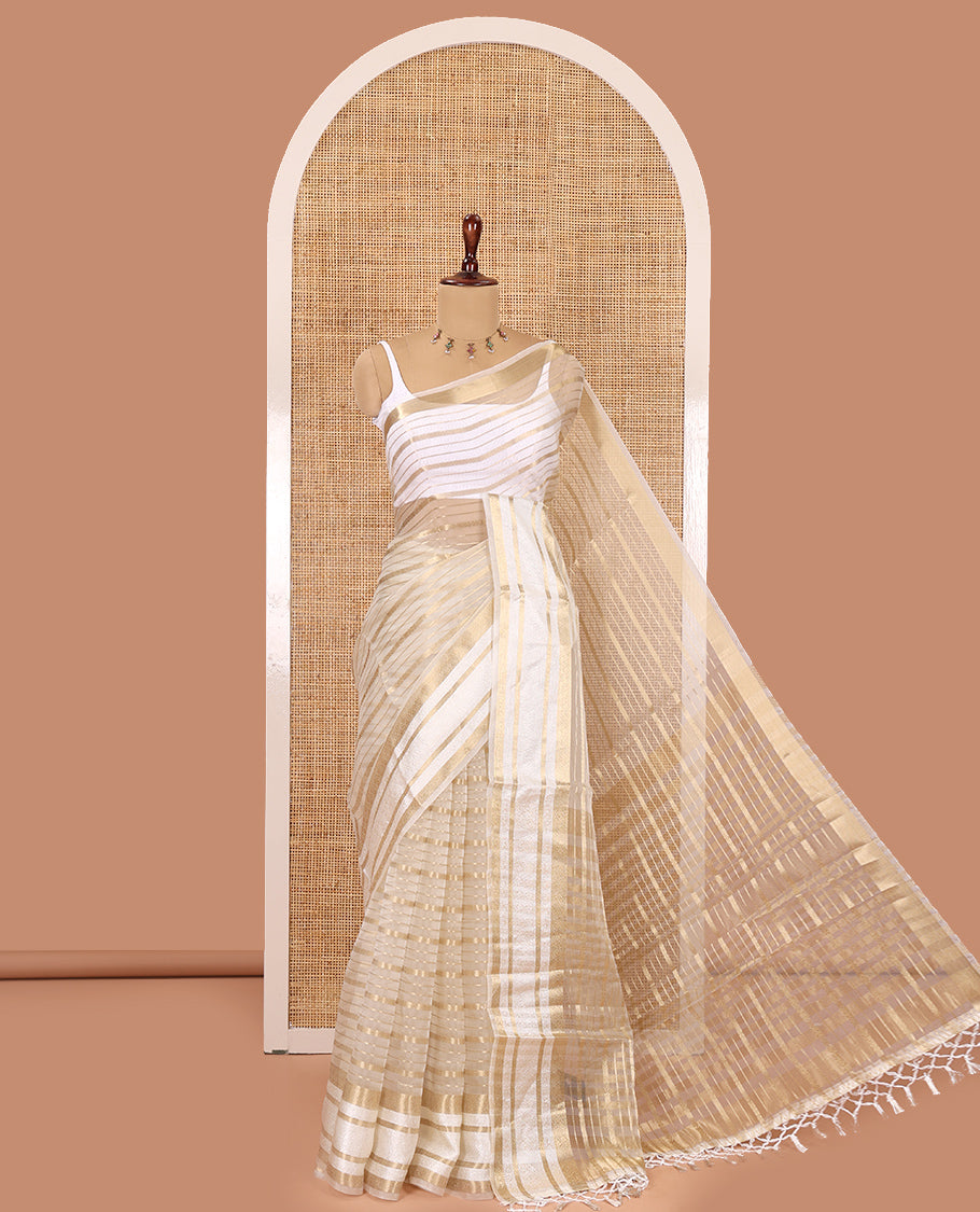 Cream Semi-Organza Saree, Uniquely Detailed with Zari Stripes, Highlighted by a Zari Traditional Border, and a Matching Blouse