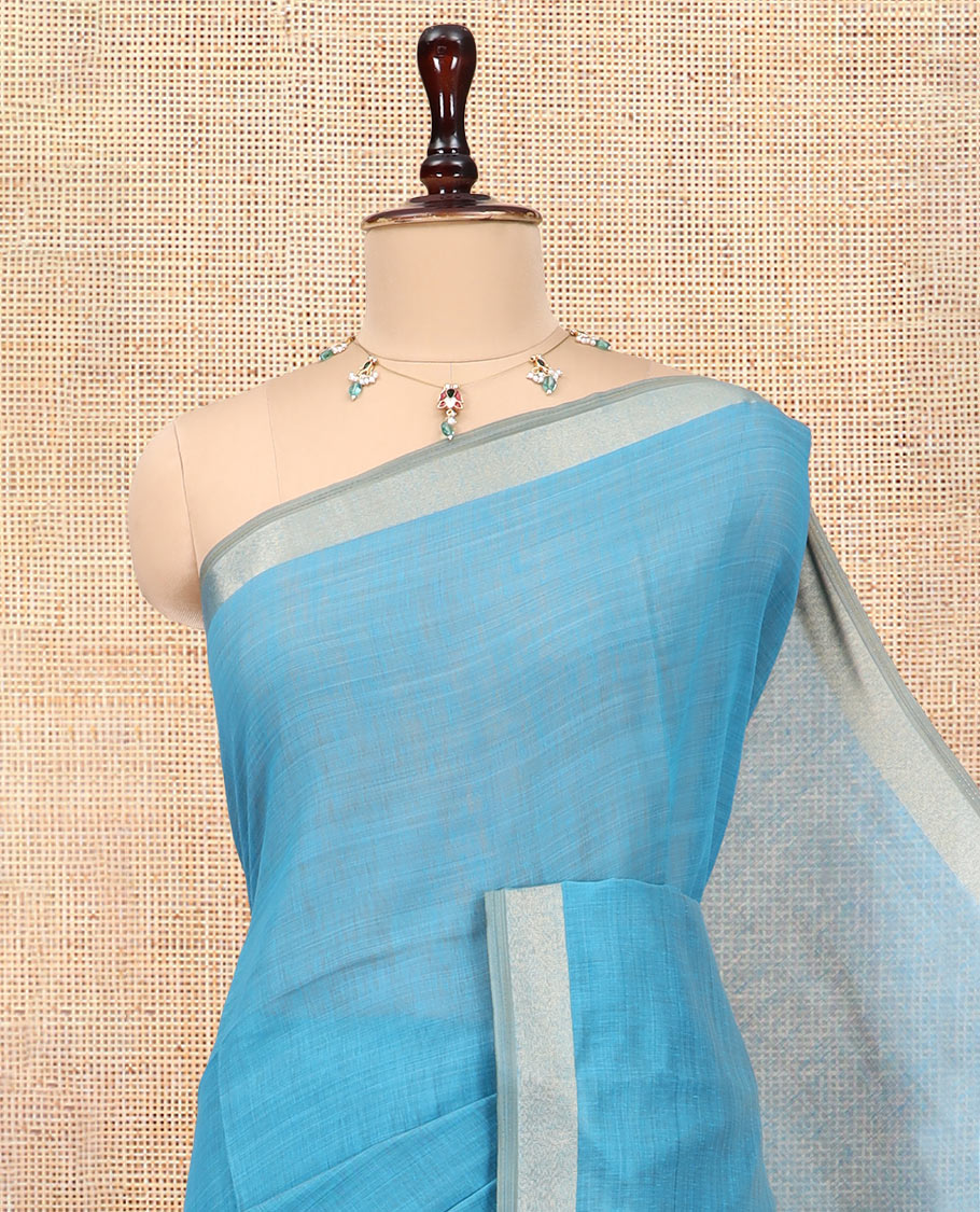 Blue Plain Semi-Tussar Saree, a Zari Border, Multi-Colored Striped Pallu, and a Contrast Blouse