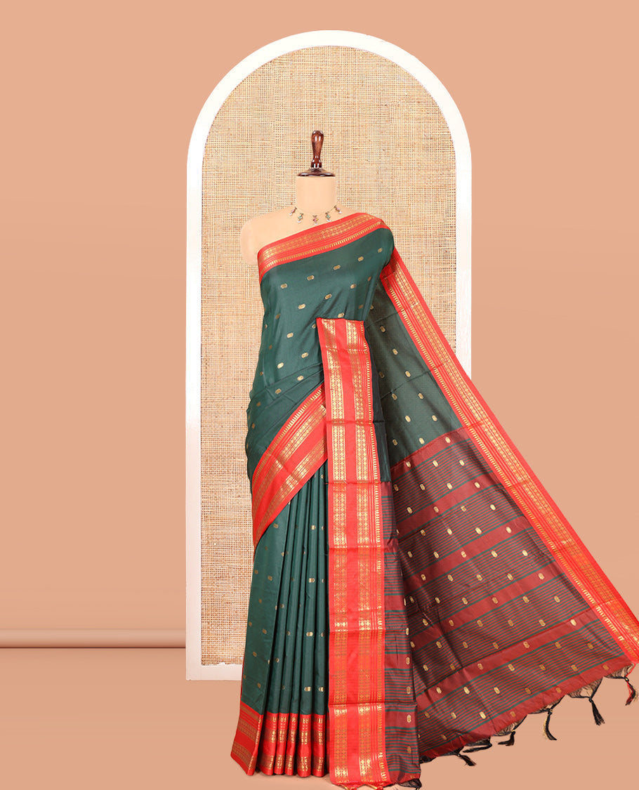Bottle Green Softy Silk Saree, Adorned with Zari Buttas, a Contrast Traditional Zari Border, and a Matching Blouse