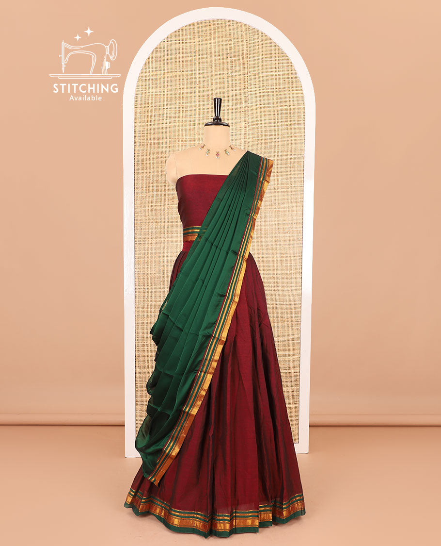 Maroon half-saree, plain with contrast traditional zari border skirt, matching zari bordered blouse, and contrast plain zari border dhavani