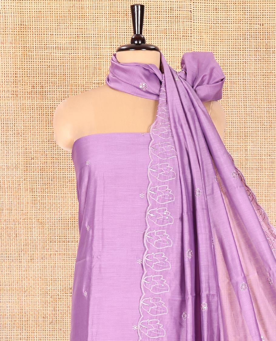 Lavender Mul Chanderi Material Chudidar Set, Elevated with Appliqué Floral Embroidery on Its Top, a Plain Santoon Bottom, and Paired Scallop Embroidered Mul Chanderi Dupatta