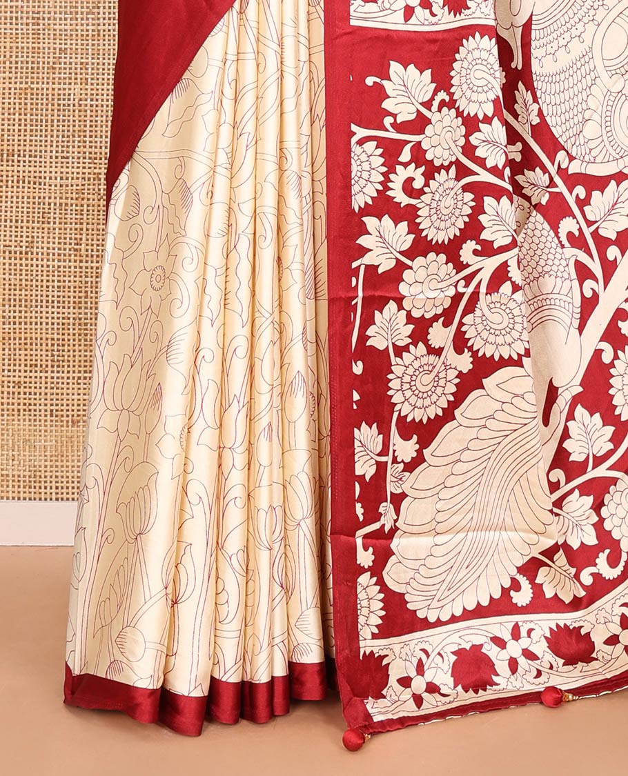 Chikku-maroon half-and-half plain and kalamkari floral printed satin crepe saree, plain border, pallu of floral vine and peacock printed, and kalamkari floral printed blouse