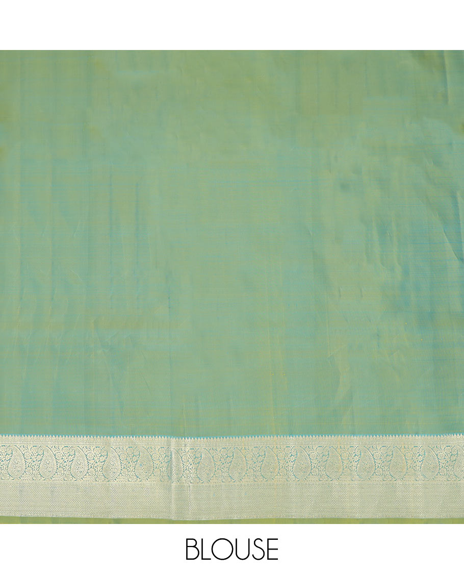 Blue Pure Silk Half-Saree Adorned with Zari Buttas Enclosed in Checks on the Skirt, Complemented by a Contrast Border Featuring Thilakam Mokku, Arumbu Manga, and Mayil Kann Designs, Paired with a Contrast Blouse, and a Jaal Design Dhavani