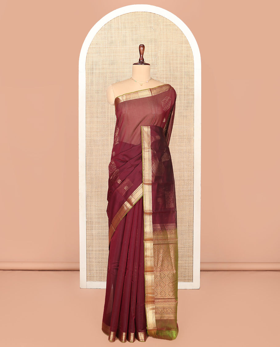 Brown Silk Cotton Saree, Embellished with Zari Buttas All Over Its Body, Complemented by Contrast Traditional Zari Designs Woven Border, Intricately Designed Pallu and Paired with a Contrast Blouse