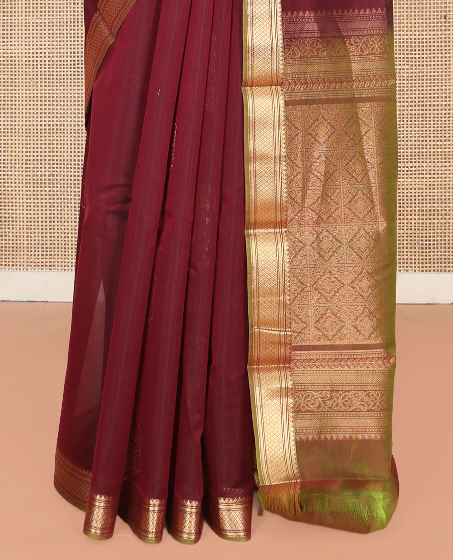 Brown Silk Cotton Saree, Embellished with Zari Buttas All Over Its Body, Complemented by Contrast Traditional Zari Designs Woven Border, Intricately Designed Pallu and Paired with a Contrast Blouse
