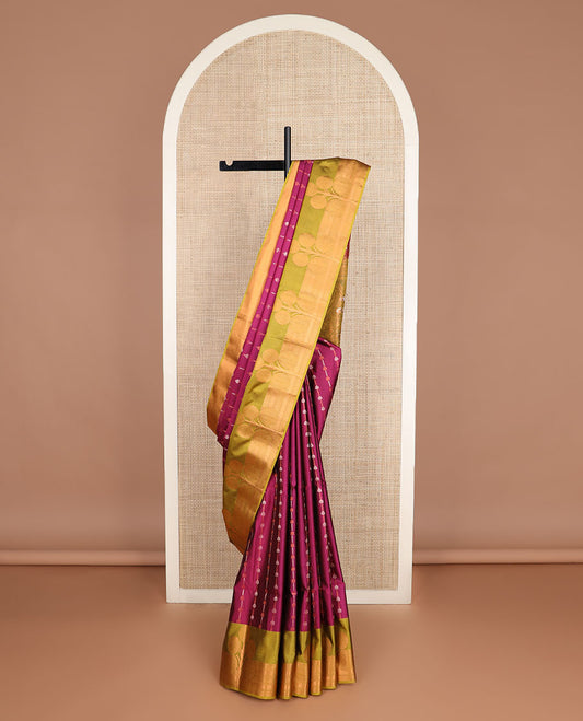 Purple zari designs soft silk saree, contrast floral zari design border, and pallu of paisley designs