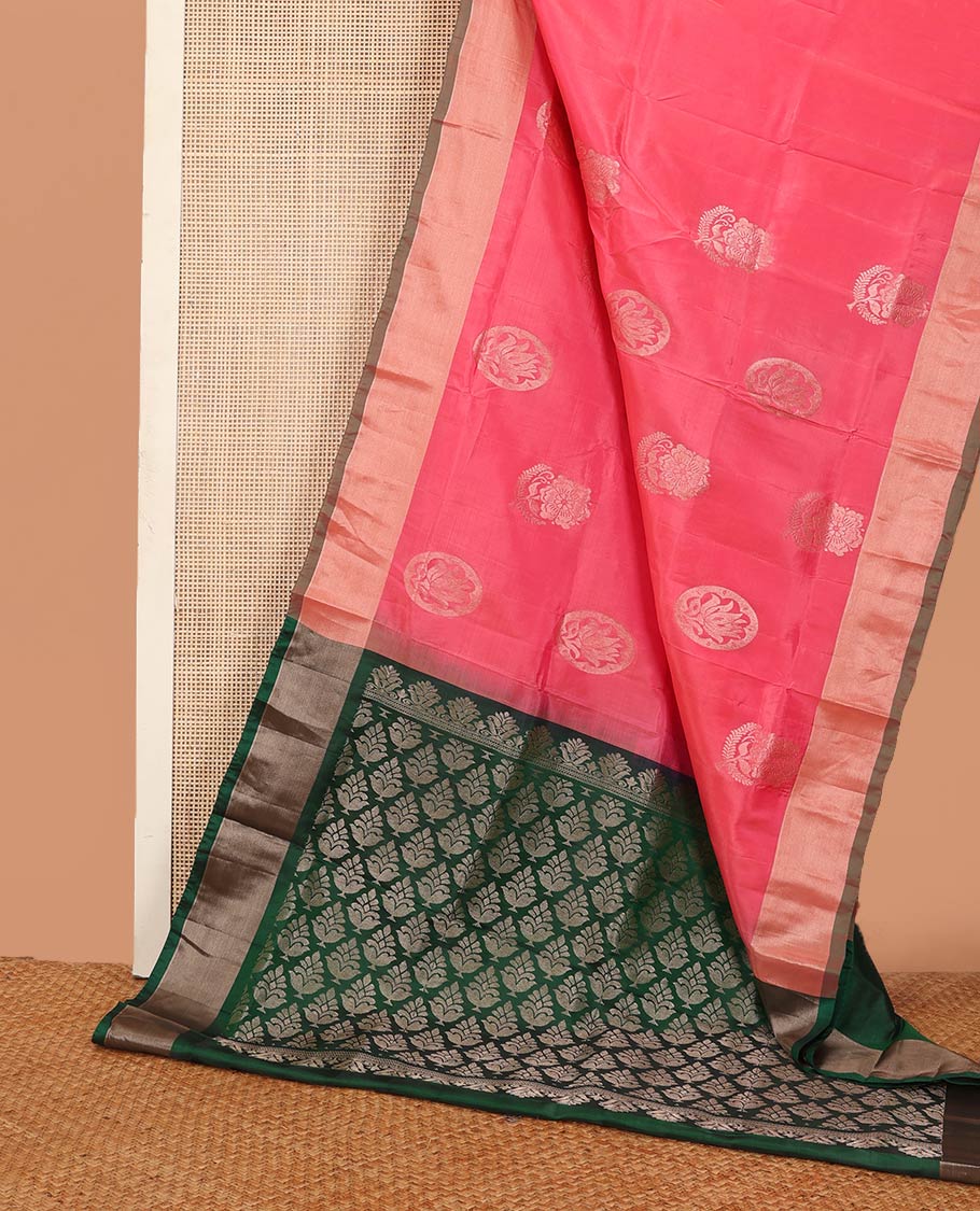 Pink zari buttas Uppada saree, bavanji border, and contrast intricate pallu