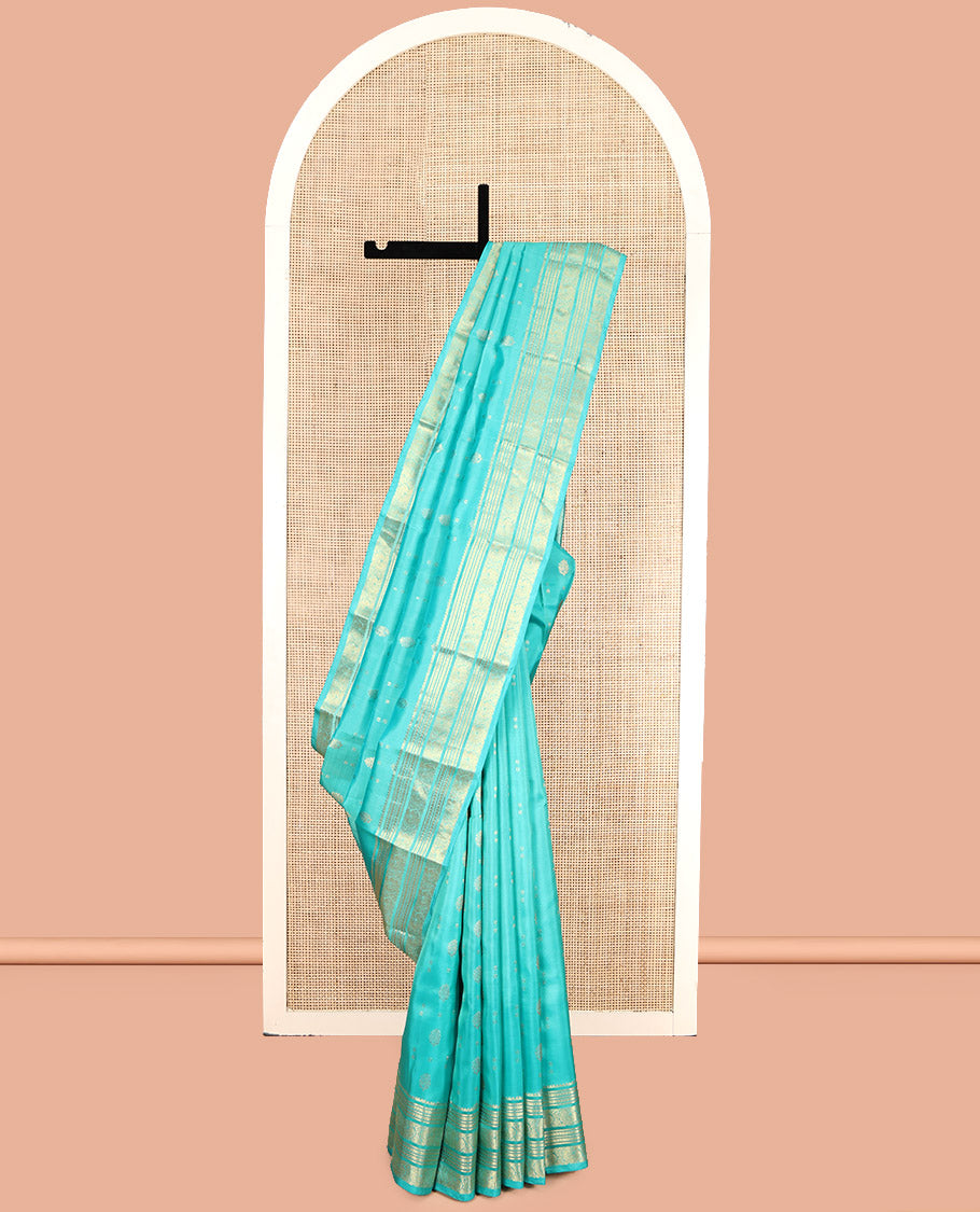 Turquoise Vasundhara Lite Silk Mix Saree, Decked Up with Zari Buttas, Highlighted by a Zari Border of Kathir, Muthu, and Mayil Designs, Intricate Pallu, and a Matching Blouse