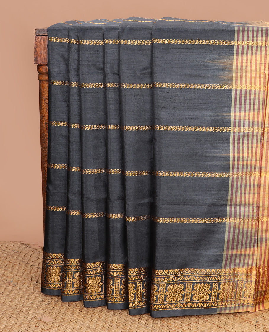 Black zari striped banana pith saree, traditional zari border, and contrast pallu of zari designs