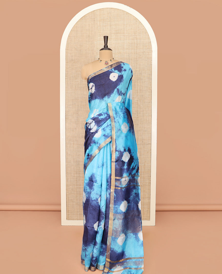 Blue Banana Pith Saree Enthralled with Shibori Prints, Zari Bavanji Border, Complemented with a Shibori Printed Pallu, and Paired with a Matching Shibori Printed Blouse