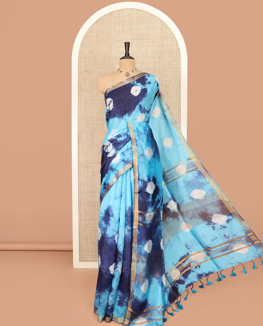 Blue Banana Pith Saree Enthralled with Shibori Prints, Zari Bavanji Border, Complemented with a Shibori Printed Pallu, and Paired with a Matching Shibori Printed Blouse