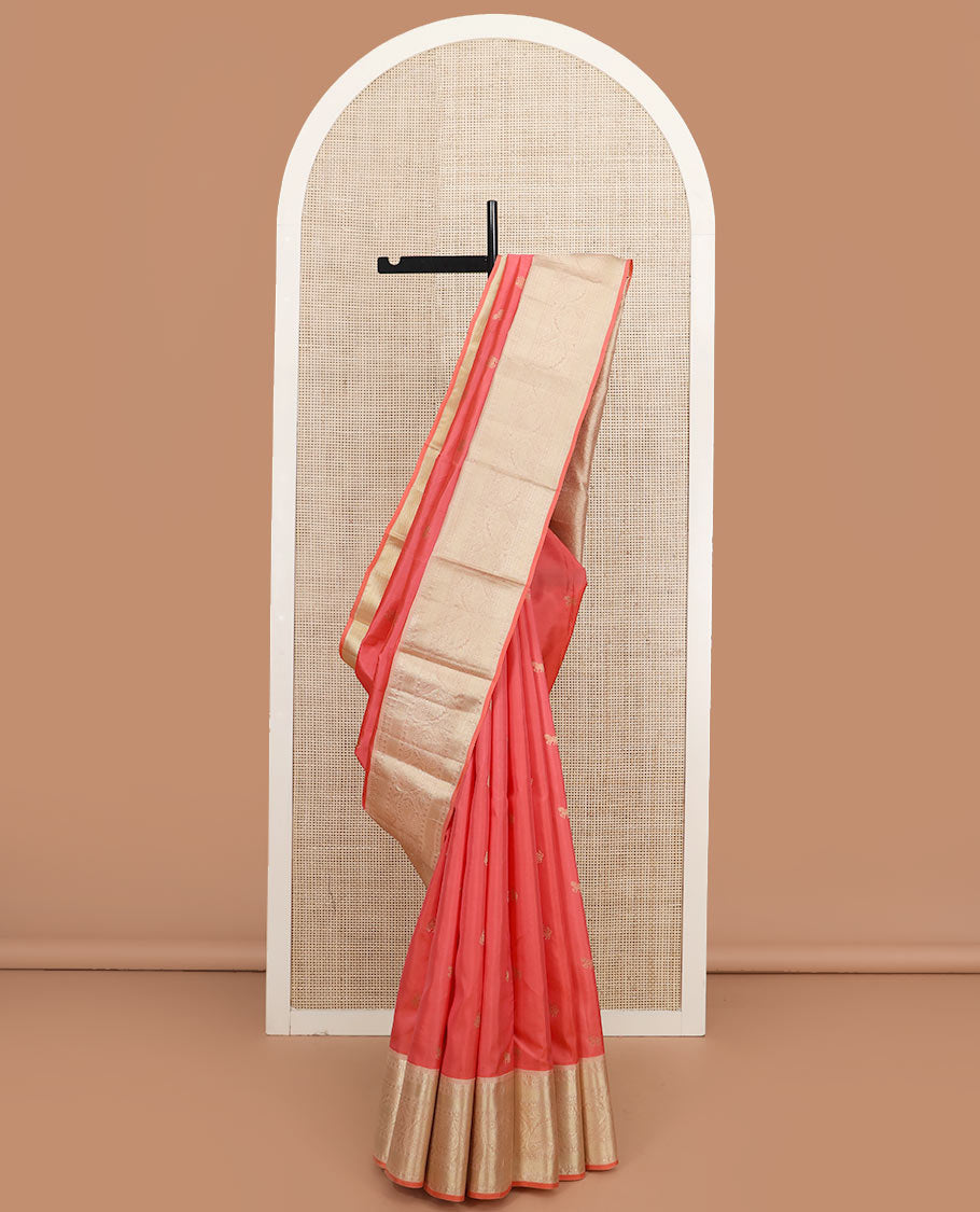 Peach zari buttas silk saree, contrast border of thilakam mokku, muthu, rudraksham, mayil kann, and manga designs, and jaal pallu