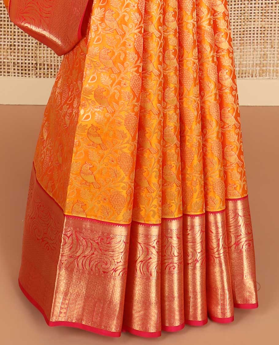 Orange floral jacqaurd kancheepuram silk saree with contrast intricate zari design border & checked floral design pallu