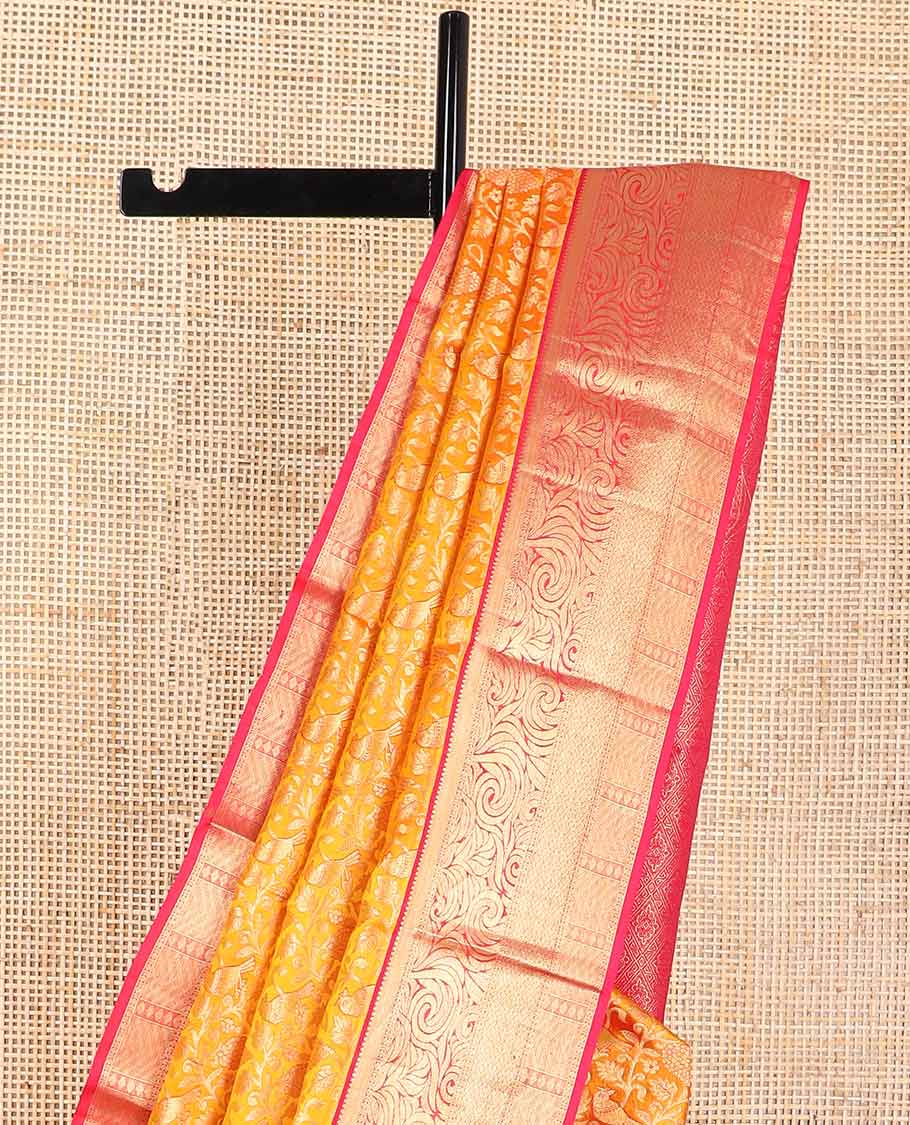 Orange floral jacqaurd kancheepuram silk saree with contrast intricate zari design border & checked floral design pallu