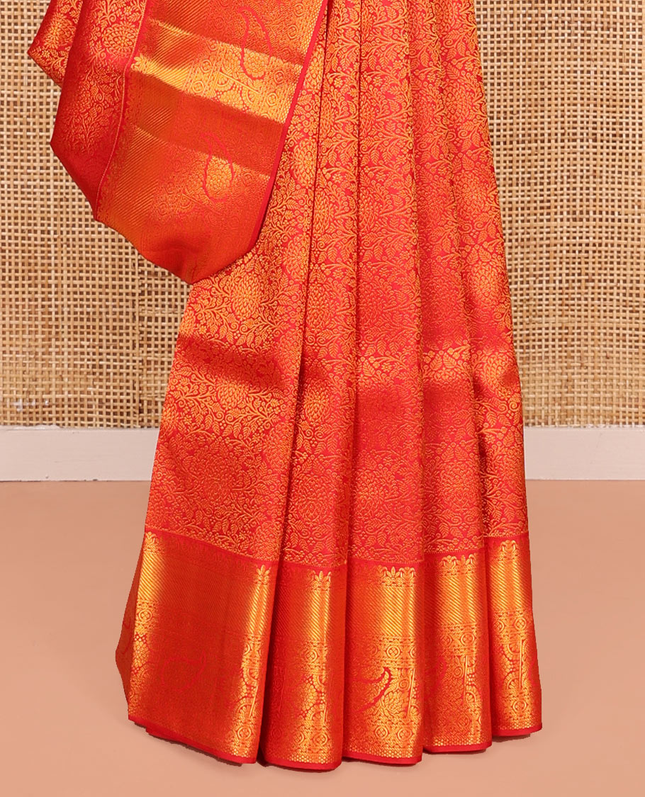 Red Kanchipuram Wedding Silk Saree, Majestically Detailed with Jacquard Design on Its Body, Highlighted by Zari Border of Traditional Designs, Grand Jaal Pallu, and Paired with a Matching Blouse