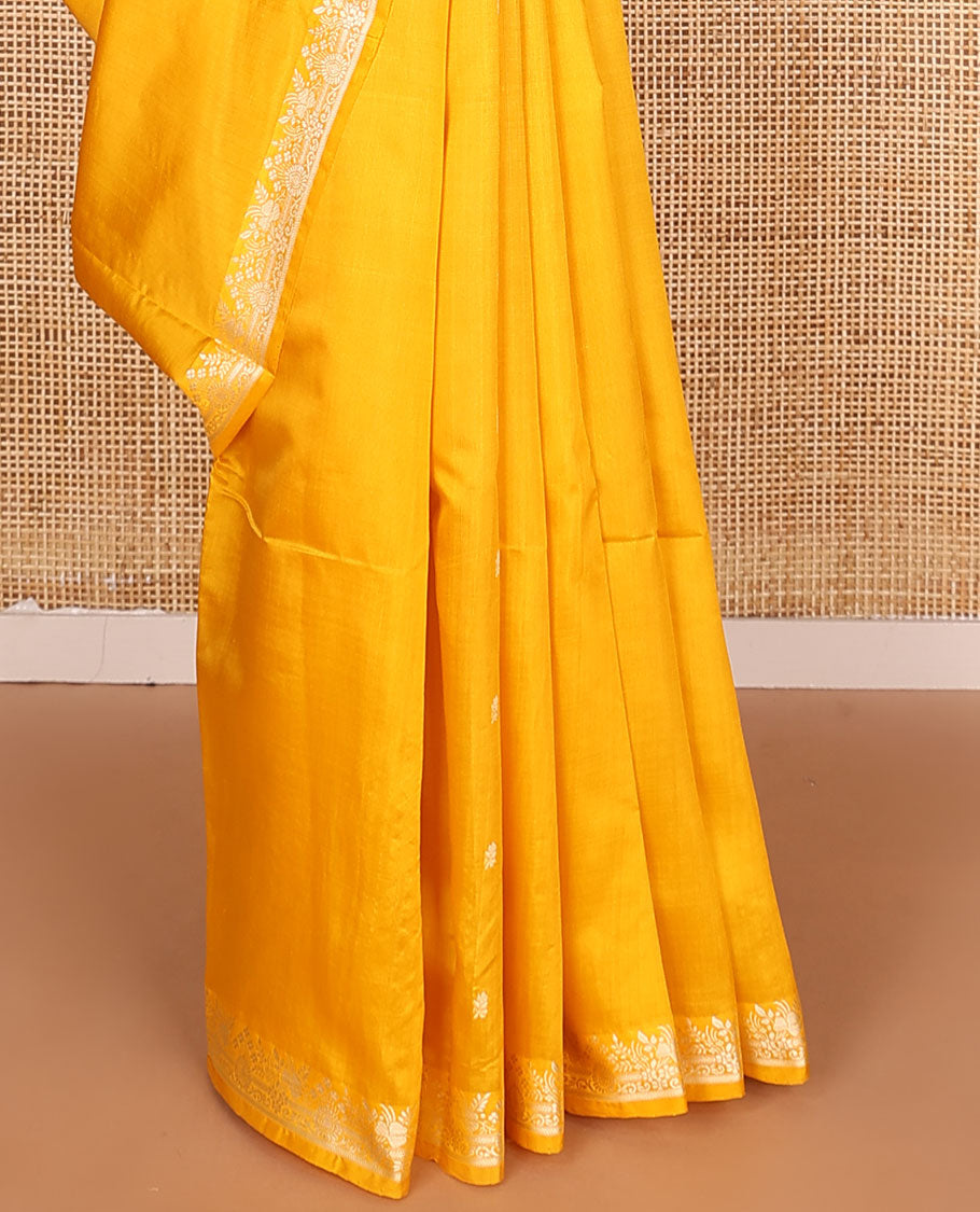 Yellow buttas woven banarasi kathan silk saree, zari border, and floral jaal pallu
