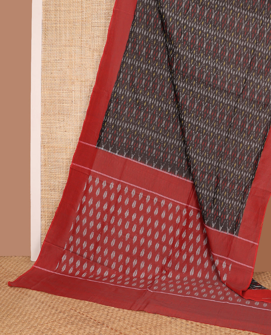 Brown ogee patterned ikkat cotton saree, contrast plain border, and pallu of buttas