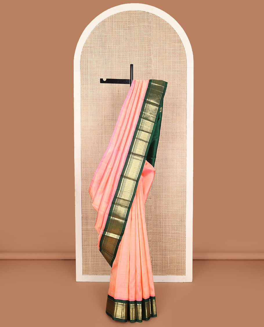 Pink zari buttas Kanchipuram silk saree, contrast one-sided korvai border of salangai, banaras, and jaal designs, and zari design pallu