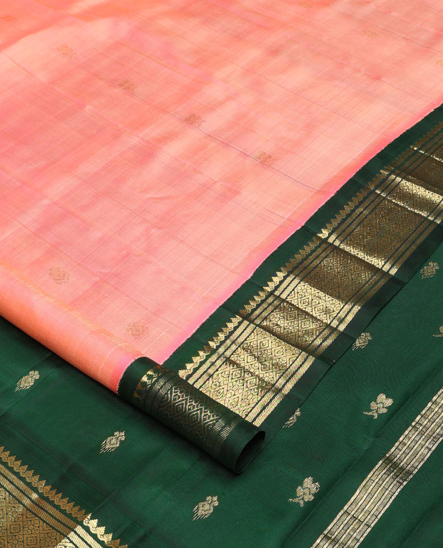 Pink zari buttas Kanchipuram silk saree, contrast one-sided korvai border of salangai, banaras, and jaal designs, and zari design pallu