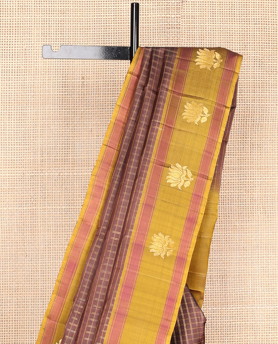 Brown checked Kanchipuram silksaree, contrast lotus design border & pallu of zari stripes