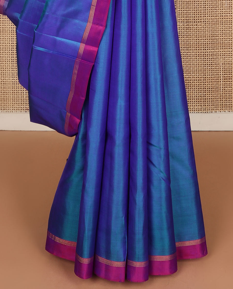 Blue plain design Kanchipuram silk saree, contrast zari striped border & zari striped pallu