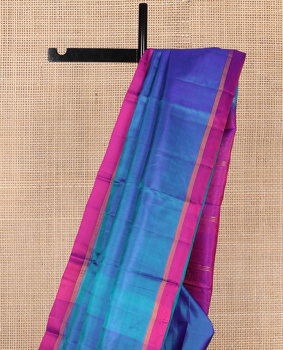 Blue plain design Kanchipuram silk saree, contrast zari striped border & zari striped pallu