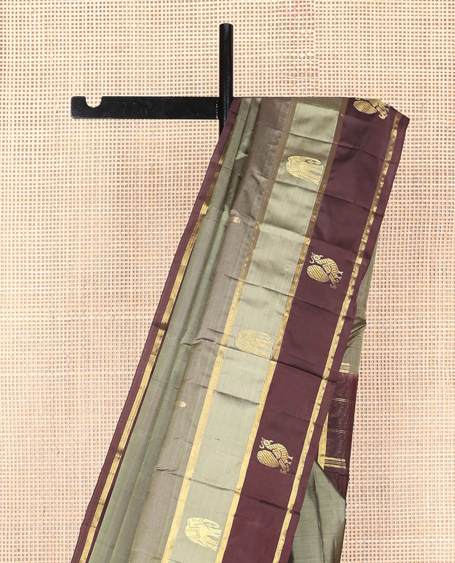 Grey zari buttas silk saree, contrast border of mayil & yaanai designs & zari design pallu