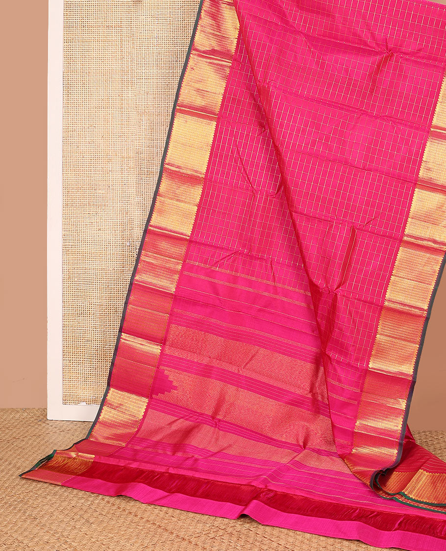 Pink zari checked Kanchipuram silk saree, zari border of rekku, banaras, and kamalam designs, and thazampoo rekku design pallu