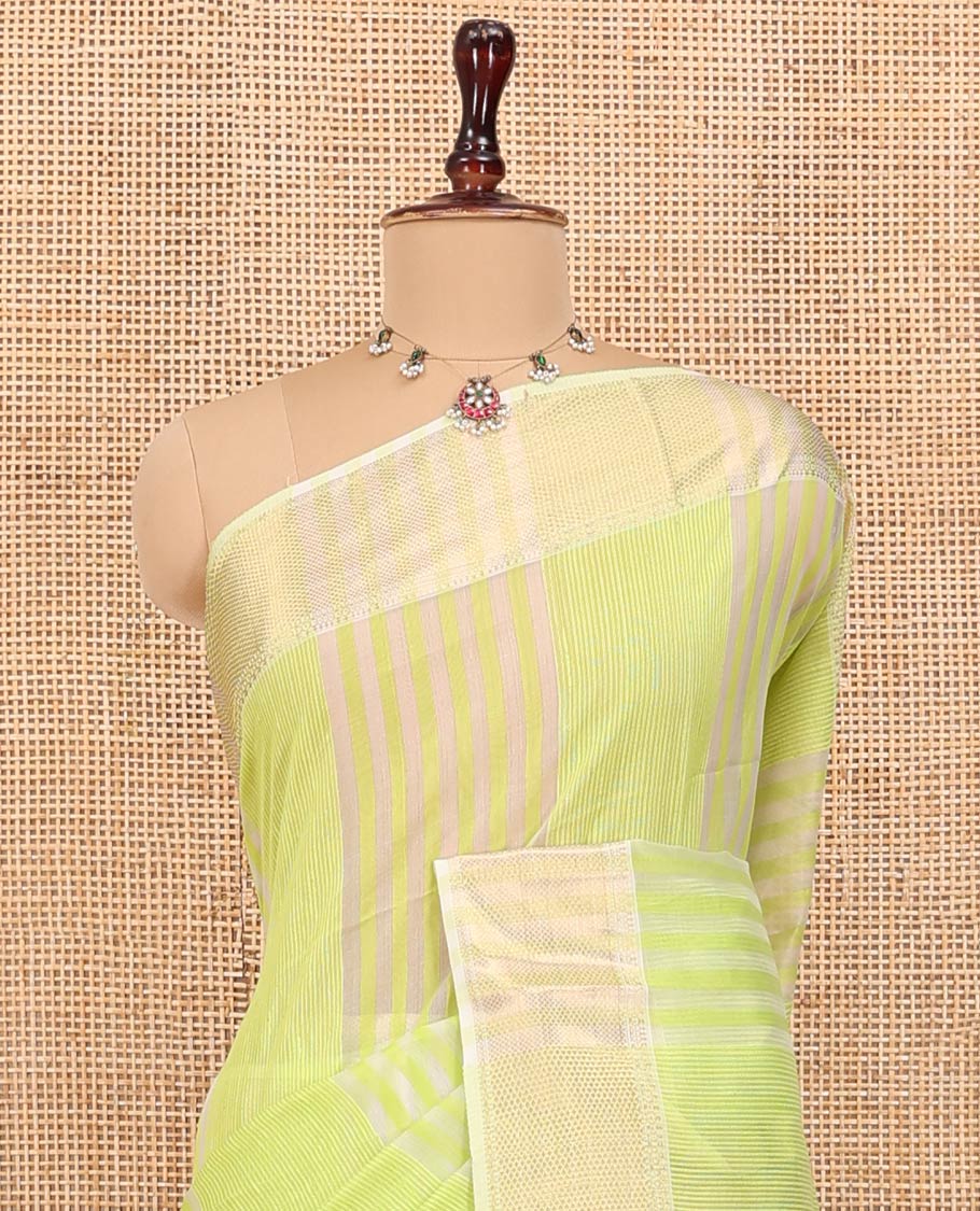 Green Maheshwari Cotton Saree, Subtly Sparkled with Stripes, Highlighted by a Zari Border, Gleaming Zari Pallu, and Paired with a Matching Blouse