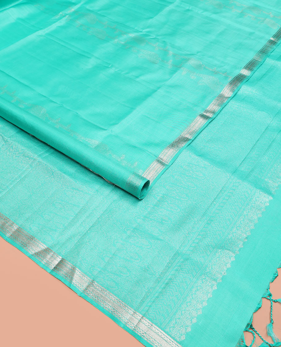 Turquoise zari design soft silk saree, zari border of kathir designs, and zari-rich pallu