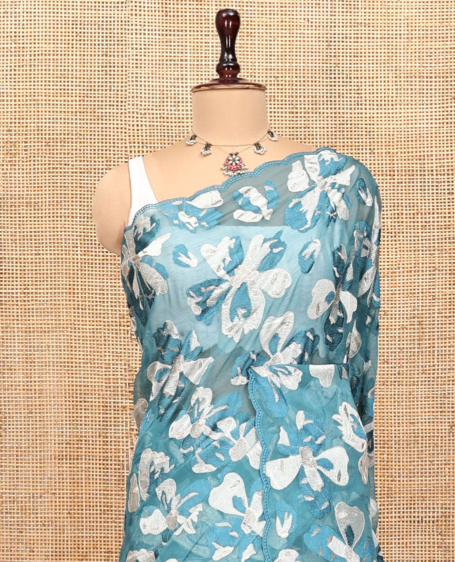 Blue Organza Saree, Impeccably Styled with Floral motifs Thread Embroidery, Scallop-Embroidered Border, and a Matching b Blouse