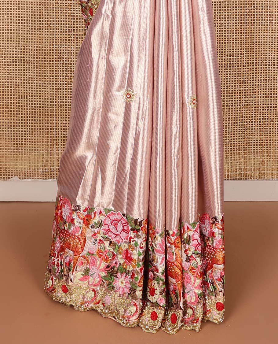 Pink jacquard with embroidered tissue silk saree, colorful jungle-theme flora-fauna mixed embroidered scallop border, and geometric patterned pallu