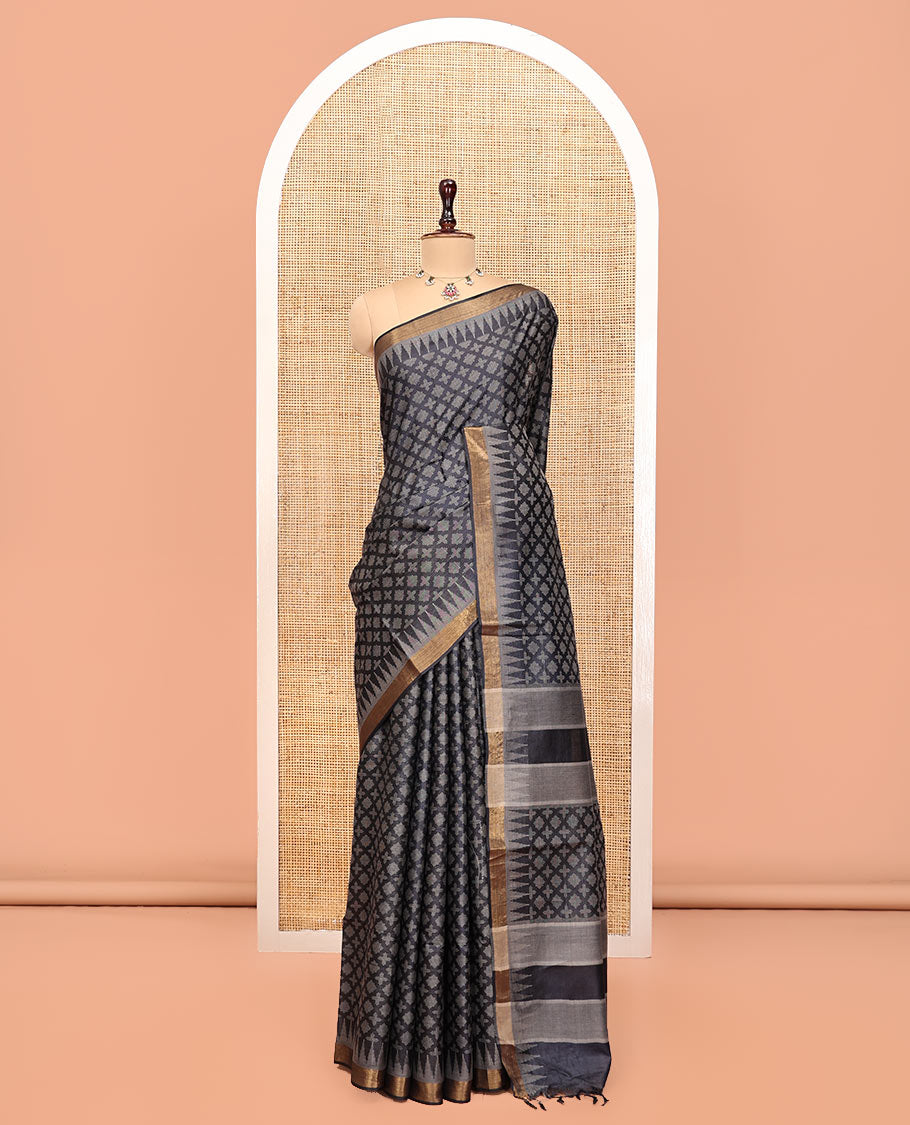Black Tussar Silk Saree, Accentuated with Buttas, a Subtle Zari Temple Border, a Self-Pallu, and a Matching Blouse
