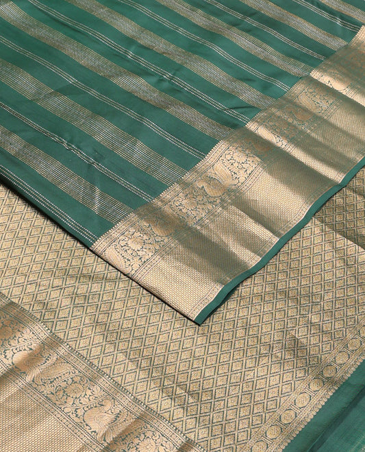 Green zari design silk saree, zari border of thilakam mokku,kodi visiry,mayil & then kuli kann & jaal pallu