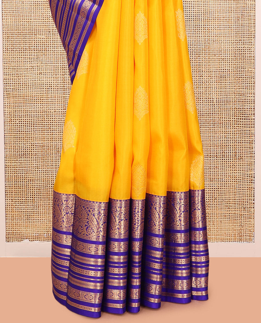 Yellow Vasundhara Silk Saree, Subtly Woven with Zari Buttas, a Contrast Border of Kodi Visiry, Muthu, and Kamalam Designs, Jaal Pallu, and a Contrast Blouse