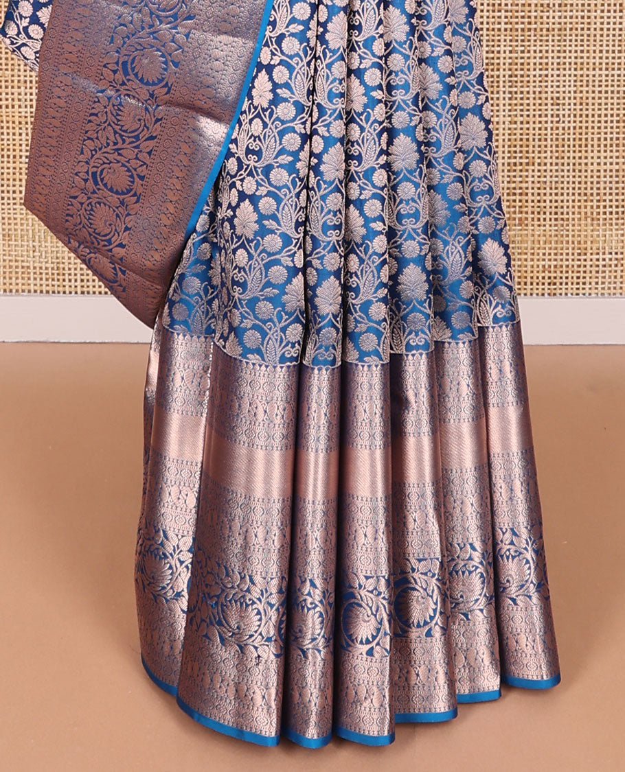 Blue floral jacquard kancheepuram silk saree with self border of thilakam mokku, banaras, poo chakram, manga, kodi visiry design & zari design pallu
