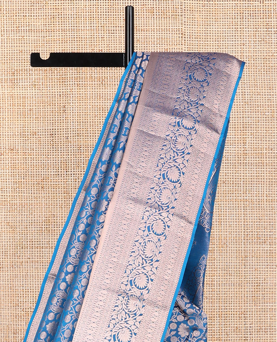 Blue floral jacquard kancheepuram silk saree with self border of thilakam mokku, banaras, poo chakram, manga, kodi visiry design & zari design pallu