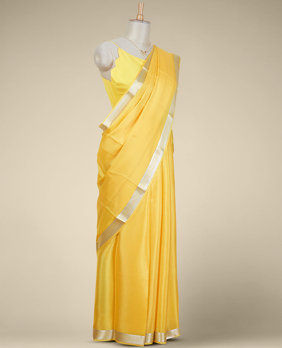 Yellow mysore silk saree with contrast floral zari design border