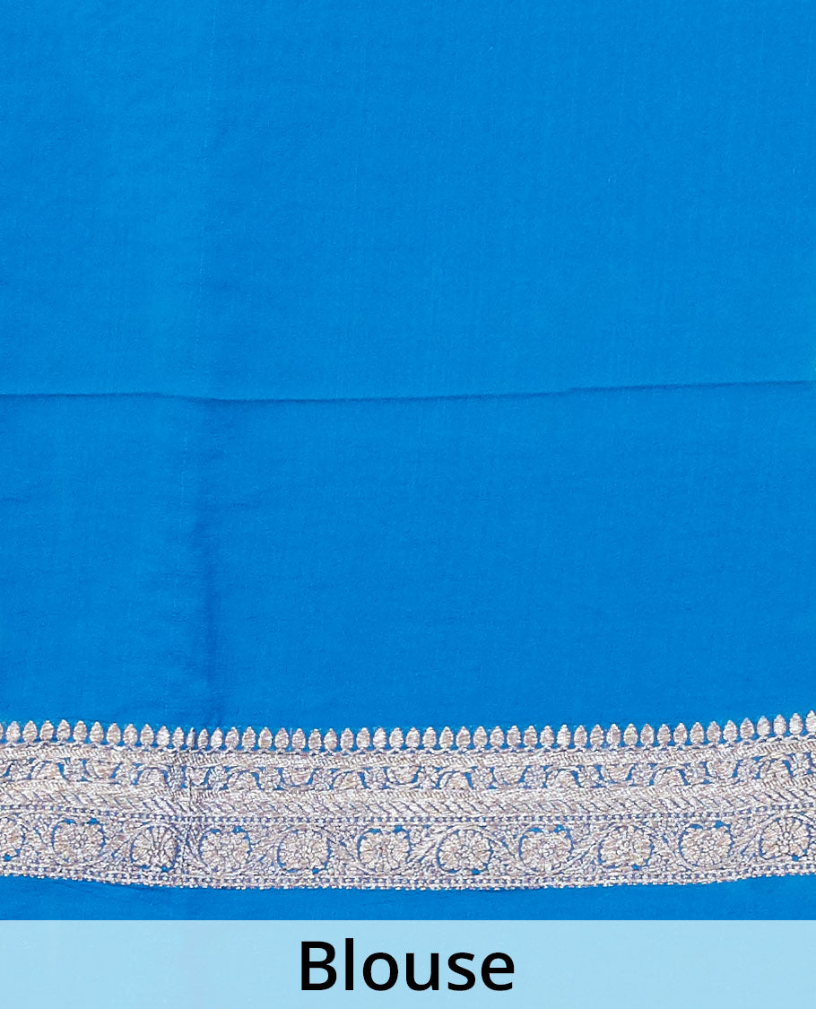 Blue floral butta banaras georgette saree with self intricare zari design border