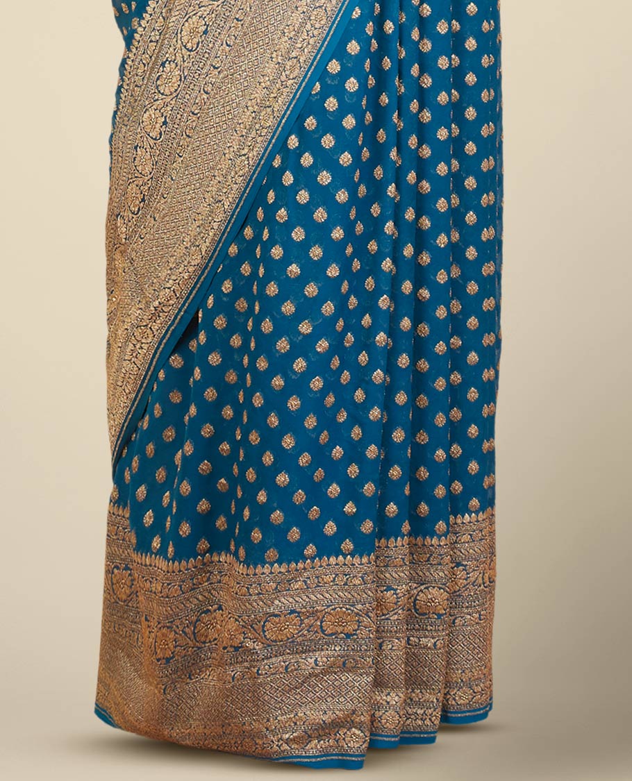 Blue floral butta banaras georgette saree with self intricare zari design border