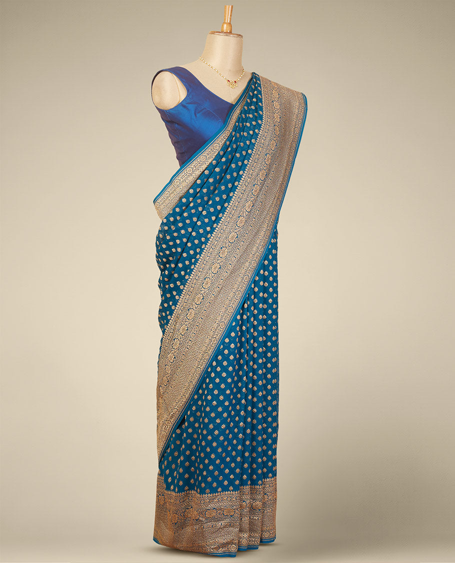 Blue floral butta banaras georgette saree with self intricare zari design border