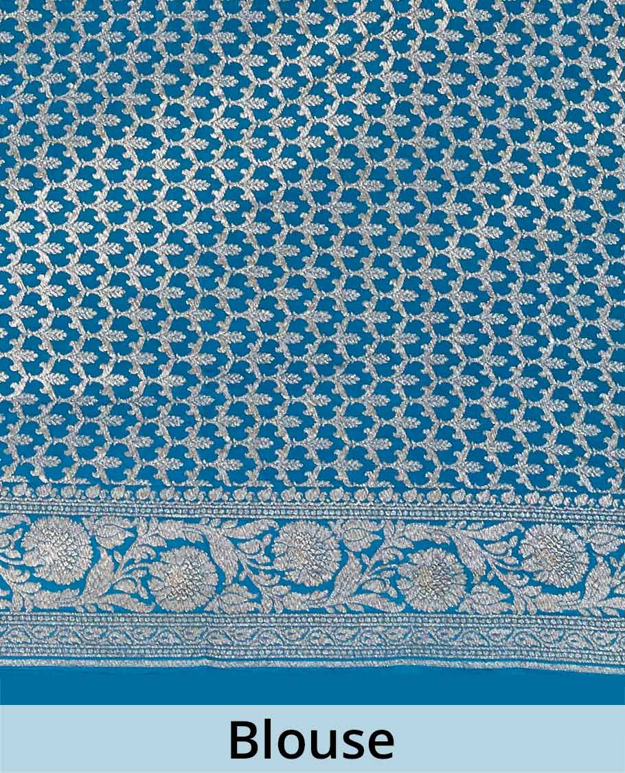 Blue floral butta crepe saree with self floral zari design border