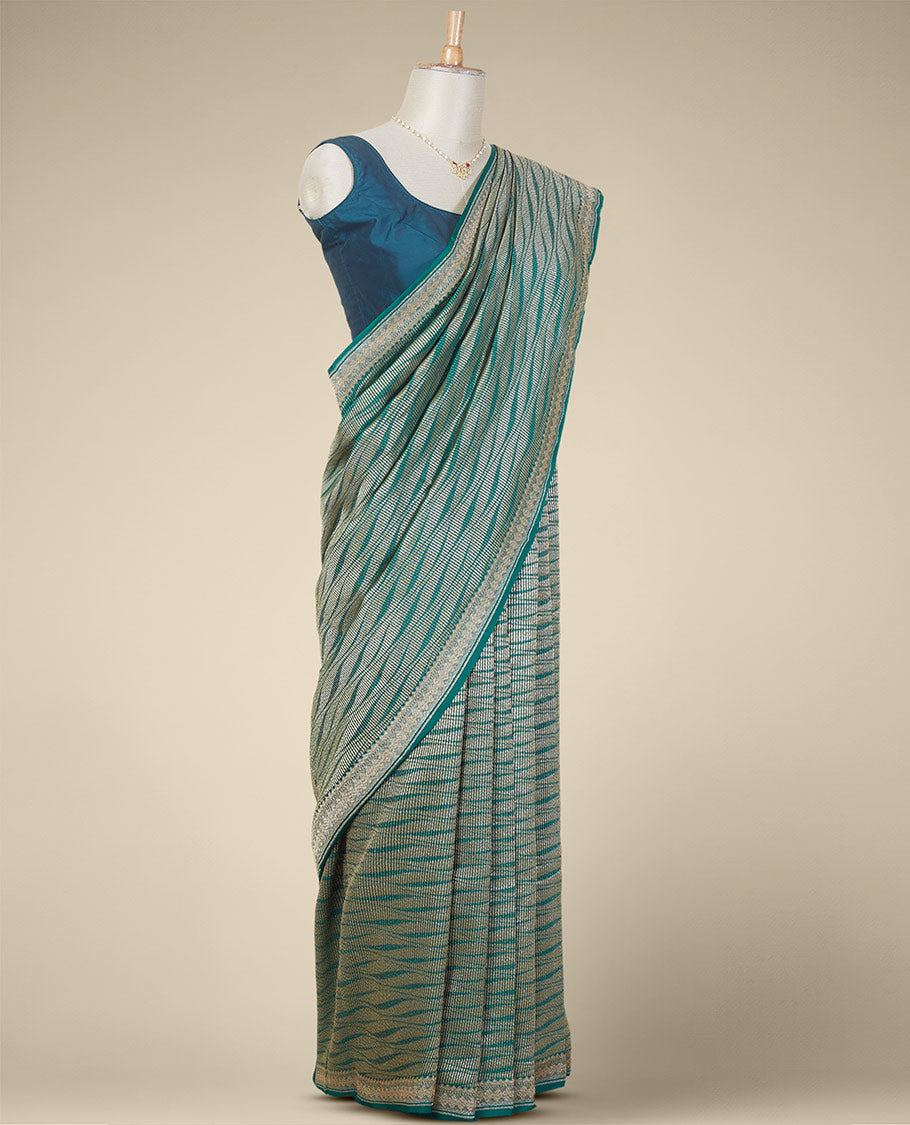 Green geometric design crepe saree with self zari design border